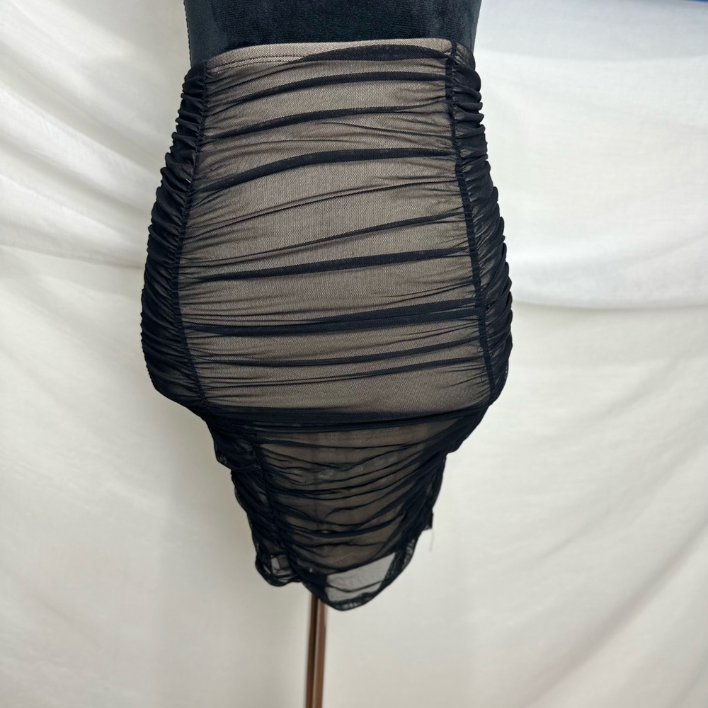 Small Black and nude mini skirt